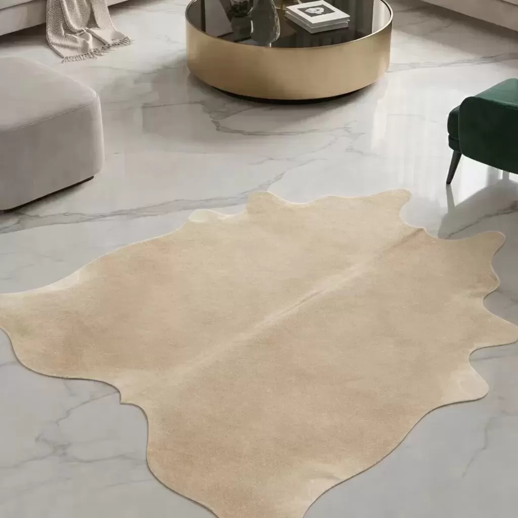 Beige cowhide rug styling